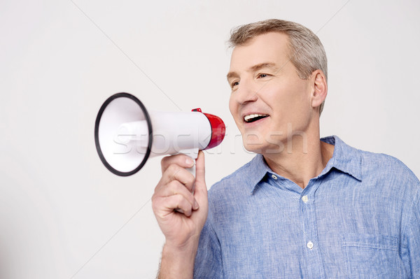 Todo o mundo ouvir me feliz homem Foto stock © stockyimages