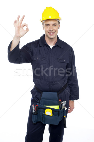 Senior repairman showing good work done sign Stock photo © stockyimages