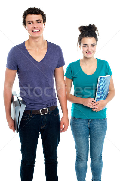 Fashionable college going students posing Stock photo © stockyimages