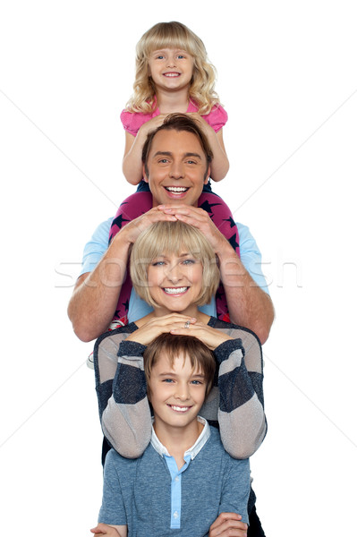 Young lovable happy family Stock photo © stockyimages
