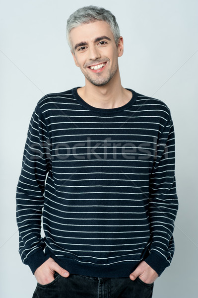 Happy handsome man in casual clothes Stock photo © stockyimages