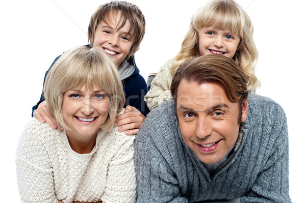 Spirited kids having fun with their parents indoors Stock photo © stockyimages