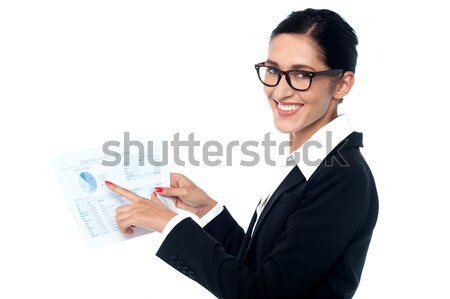 Manager reviewing business document Stock photo © stockyimages