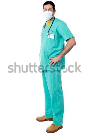 Experiente cirurgião mãos cintura jovem masculino Foto stock © stockyimages