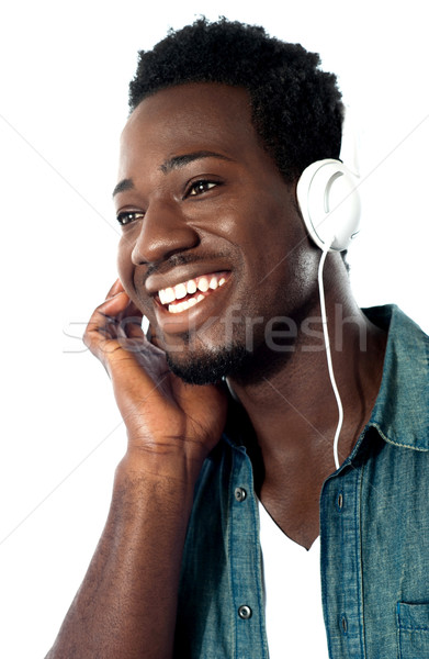 Young man with headphones Stock photo © stockyimages