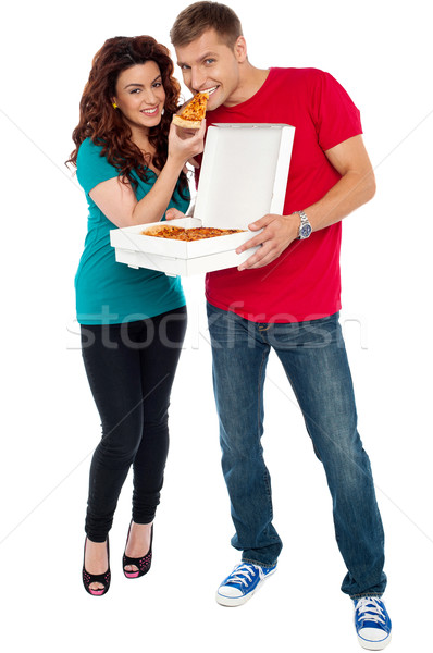 Paar genießen Pizza zusammen groß Kleben Stock foto © stockyimages