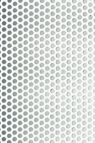 Perforated metal grid texture Stock photo © stockyimages