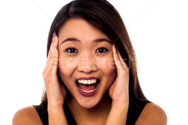 Shocking expression by a young girl Stock photo © stockyimages