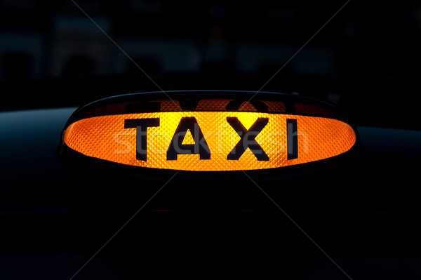 Stock photo: Taxi logo highlighted