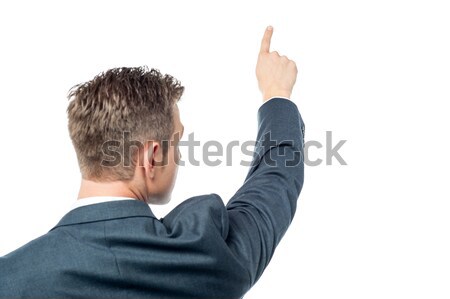 Businessman pointing copy space Stock photo © stockyimages
