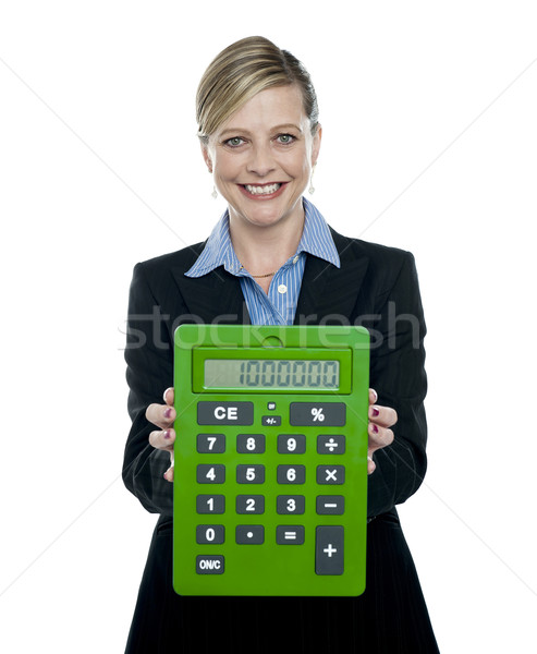 Foto stock: Mujer · de · negocios · grande · verde · calculadora · blanco