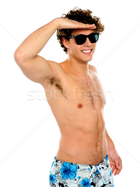 Kaukasisch jongen naar ver zonnebril Stockfoto © stockyimages