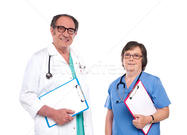 Sorridente profissionais médico informação Foto stock © stockyimages