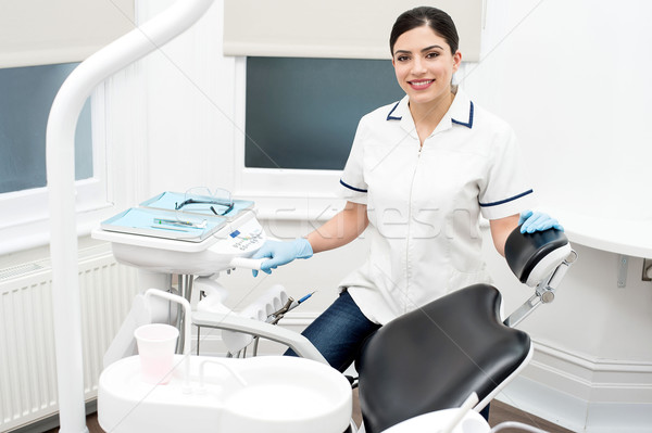 стоматологических улыбаясь камеры женщины стоматолога Постоянный Сток-фото © stockyimages