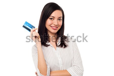 Business lady showing credit card to camera Stock photo © stockyimages