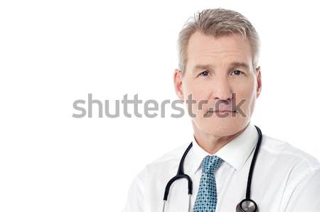 Sorridere competente medico isolato bianco senior Foto d'archivio © stockyimages