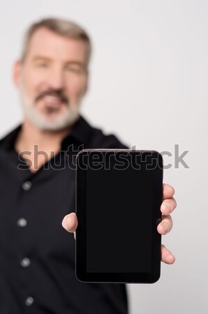 This tablet comes with exclusive offer for sale !  Stock photo © stockyimages