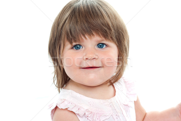 Közelkép lövés pufók női gyerek kék szemek Stock fotó © stockyimages