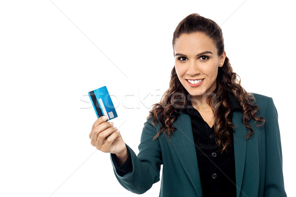 Businesswoman displaying her cash card Stock photo © stockyimages
