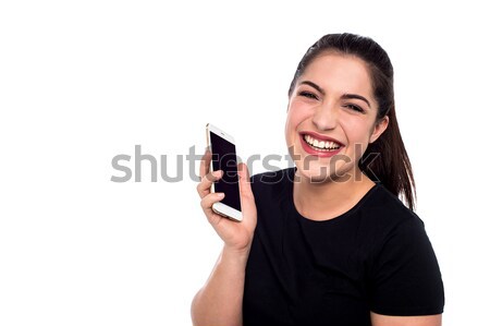 Vicces beszél derűs nő nevet mobiltelefon Stock fotó © stockyimages