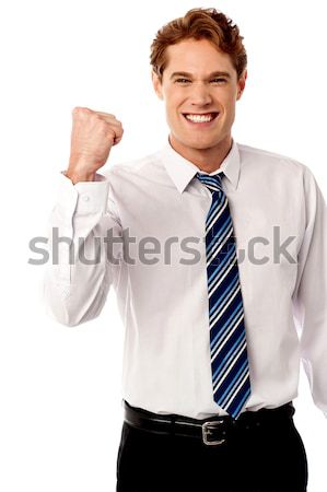 Cool young businessman enjoying music Stock photo © stockyimages
