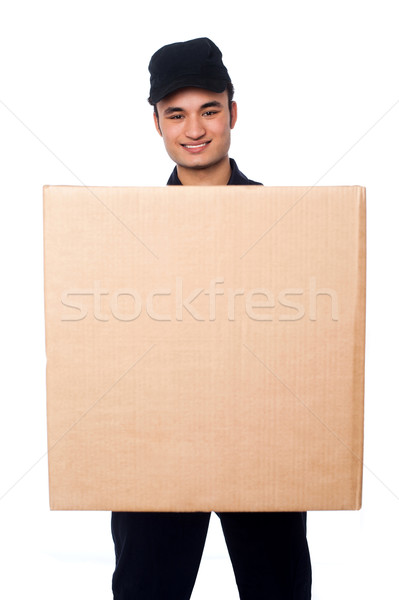 Young boy delivering parcel Stock photo © stockyimages