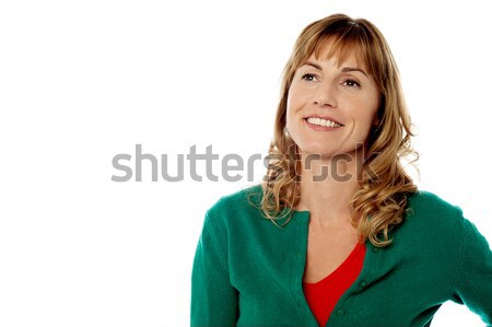 Woman recalling her golden days Stock photo © stockyimages