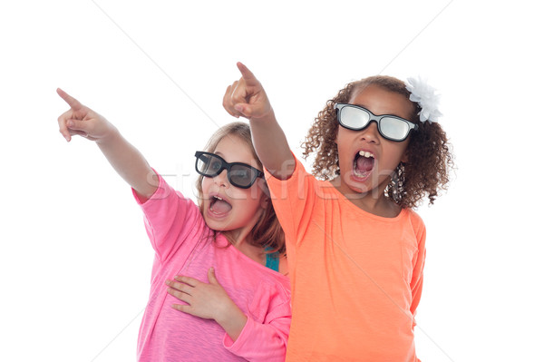 Little girls pointing away Stock photo © stockyimages
