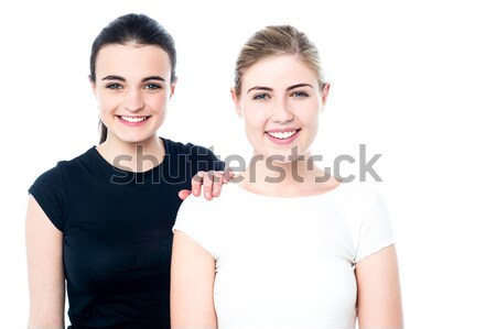 Attractive fitness girls posing casually Stock photo © stockyimages