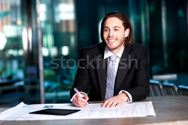 Smart businessman projecting his plans Stock photo © stockyimages
