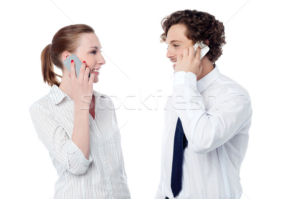 Business verloofd telefoongesprek jonge collega's Stockfoto © stockyimages