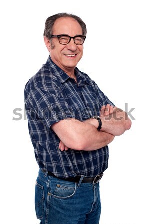 Guapo altos masculina posando estilo los brazos cruzados Foto stock © stockyimages