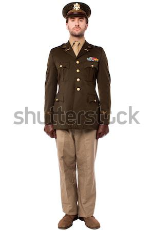 Military officer in attention position Stock photo © stockyimages