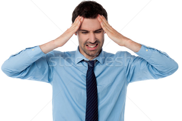 Man having severe headache Stock photo © stockyimages