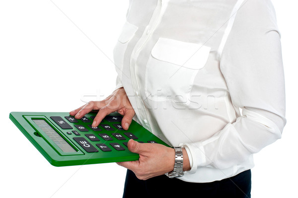 Nő kisajtolás számjegy számológép üzlet munka Stock fotó © stockyimages