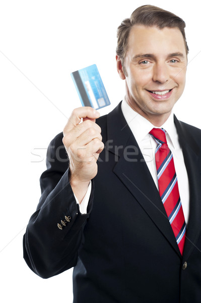 Stock fotó: üzlet · képviselő · mutat · hitelkártya · kamerába · mosolyog