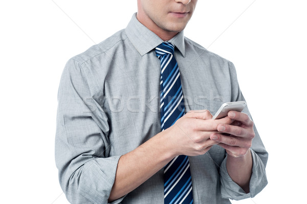 Business executive using cell phone Stock photo © stockyimages