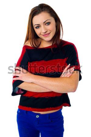 Confident young woman in trendy attire Stock photo © stockyimages