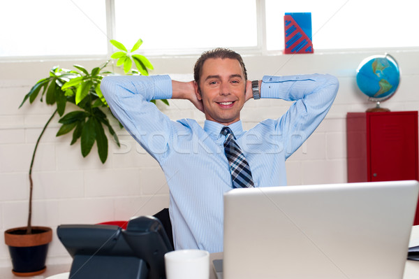 Manager relaxing in his office, work break Stock photo © stockyimages