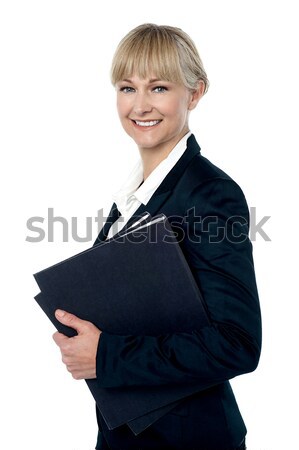 Pretty business woman ready to attend meeting Stock photo © stockyimages