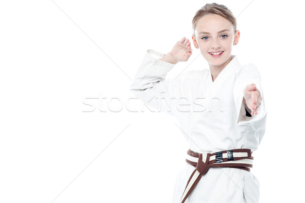 Jungen Karate kid posiert Kämpfer Maßnahmen Stock foto © stockyimages