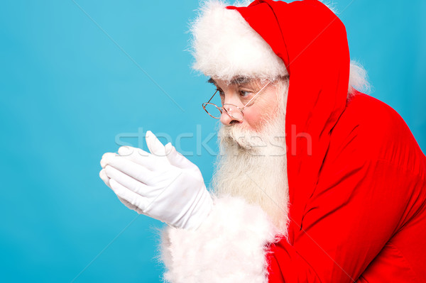 Soplar nieve papá noel listo rojo vestido Foto stock © stockyimages