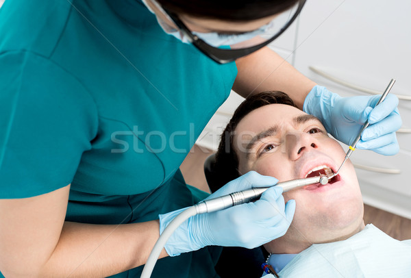 Adam diş erkek açmak ağız oral Stok fotoğraf © stockyimages