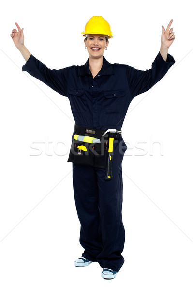 Mosolyog hölgy munkás kezek ujjongás összes Stock fotó © stockyimages