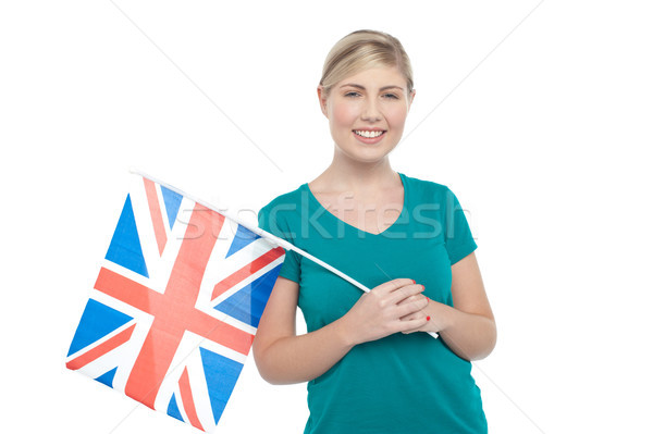 Young UK supporter holding national flag Stock photo © stockyimages