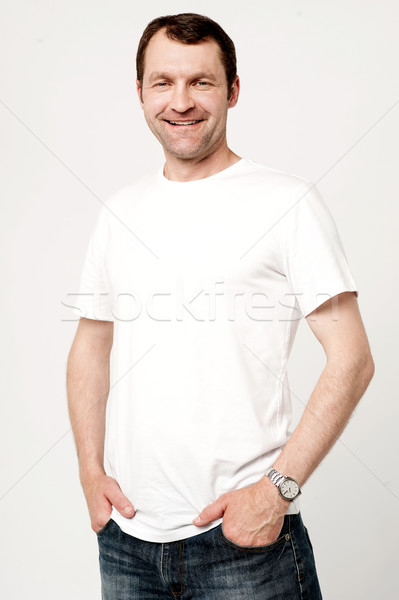 Casual shot of relaxed male model Stock photo © stockyimages