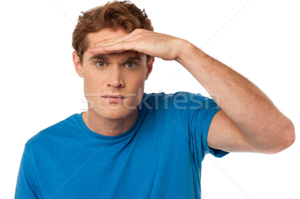Man observing something closely Stock photo © stockyimages
