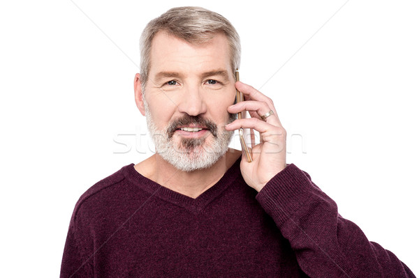 Bonjour homme mûr parler téléphone portable technologie mobiles [[stock_photo]] © stockyimages