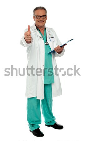 Medical practitioner showing excellent gesture Stock photo © stockyimages