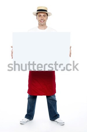 Chef holding blank advertising board Stock photo © stockyimages